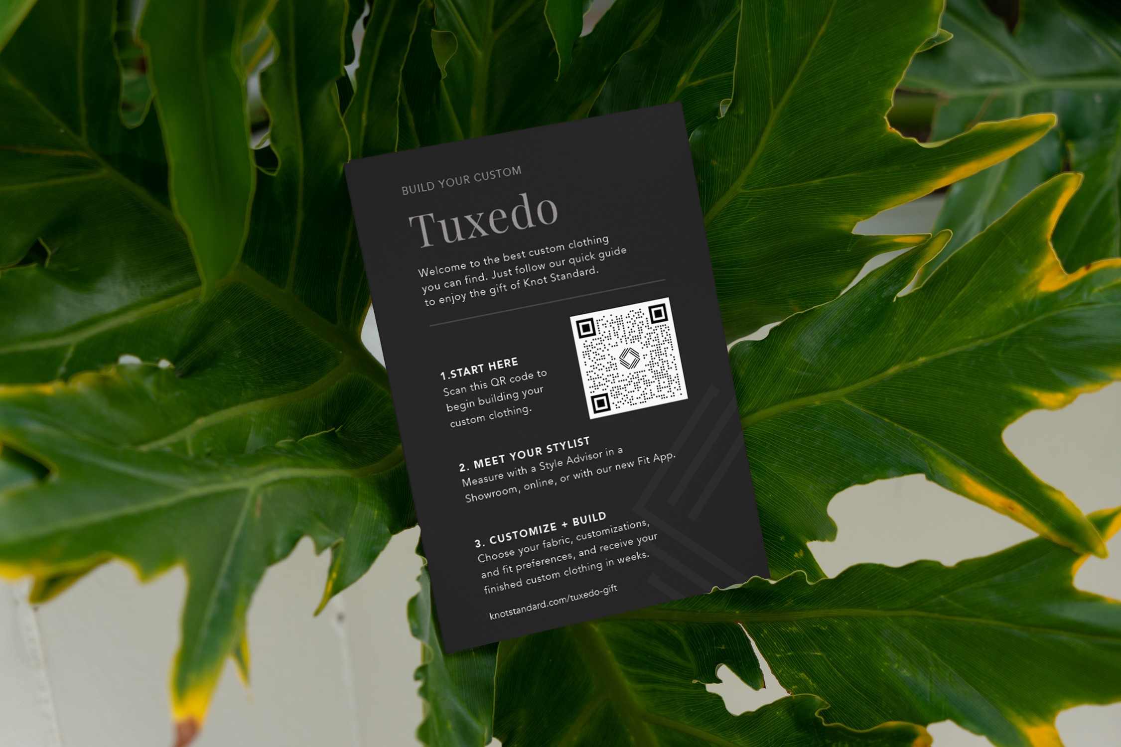 Graphic of a typography specimen showing the alphabet and numerals on top of a dark gray background.