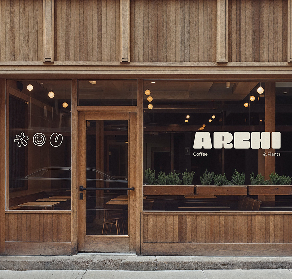 Stylized blue and pink image of a whiskey glass with the wordmark of Vèloce in pink all-caps letters above.